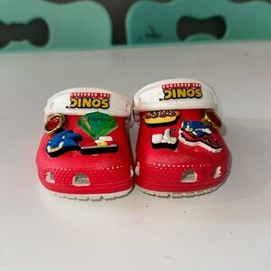 Hello I am selling these size 4c crocs they are from the brand Crocs.